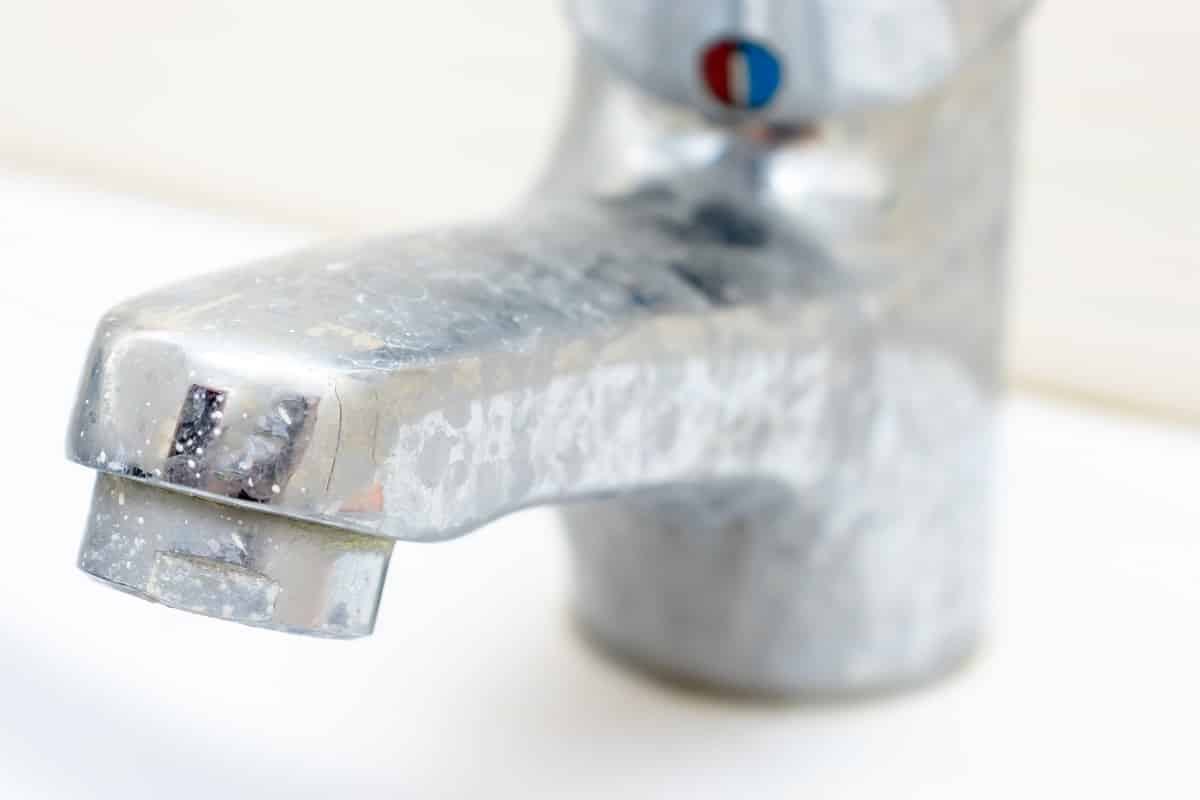 Faucet Hard Water Stains Adobestock 256637624