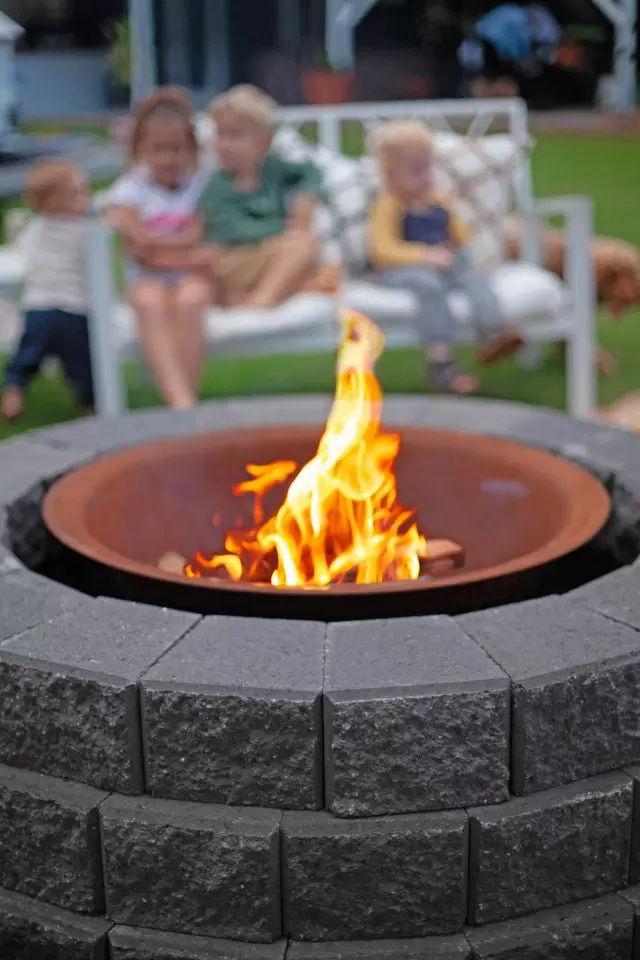 Fire Pit With Kids In Background