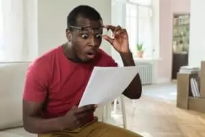 Shocked Man Looking At Bill
